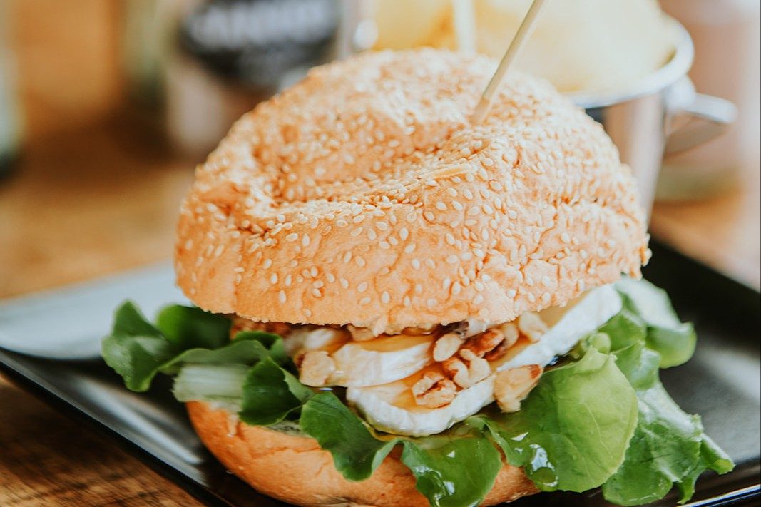 Brie with walnuts and honey sandwich.